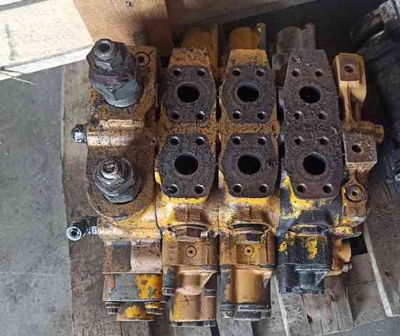 Ищу распределитель на бульдозер CAT D9. 