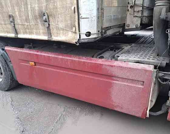 Нужен такой спойлер (только левая сторона) топливного бака Рено Магнум. 