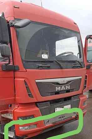 На MAN TGM нужны 81416106807 нижняя часть бампера (средняя часть), 81416105718 облицовка фары правая Вся Россия