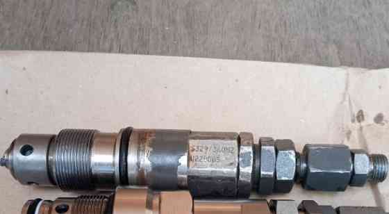 Нужен клапан распределителя на Volvo 380, номер VOE14577744. Вся Россия