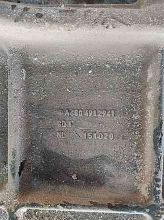 Ищу А6804912941 кронштейн катализатора мп4. 